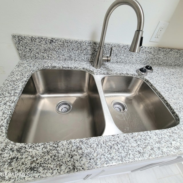 2916 Beachcomber, El Paso, TX 79936 - kitchen view of a sink and light stone counters
