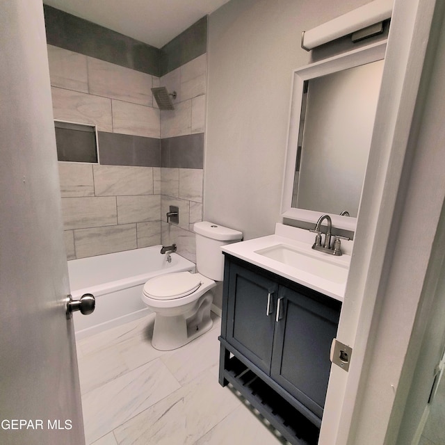 2916 Beachcomber, El Paso, TX 79936 - full bath featuring toilet, vanity, marble finish floors, and bathing tub / shower combination