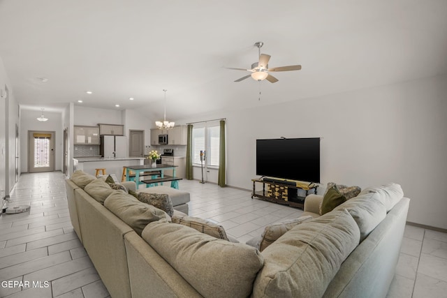 13804 Sky Ranger Ave, Horizon City, TX 79928 - living room featuring a ceiling fan, baseboards, a chandelier, and recessed lighting