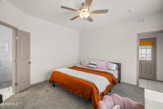 13804 Sky Ranger Ave, Horizon City, TX 79928 - carpeted bedroom featuring baseboards, ceiling fan, and tile patterned floors