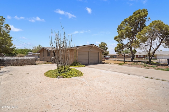 4112 Blackstone Ct, El Paso, TX 79922 - view of front of house with driveway, an attached garage, and brick siding