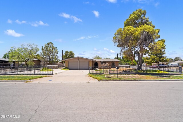 4112 Blackstone Ct, El Paso, TX 79922 - view of front of house with an attached garage, driveway, and a fenced front yard