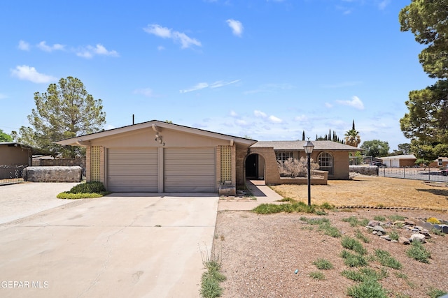 4112 Blackstone Ct, El Paso, TX 79922 - view of front facade featuring brick siding, concrete driveway, and a garage