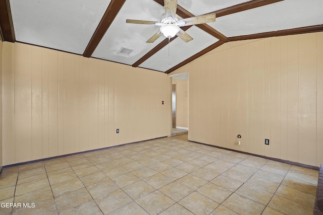 4112 Blackstone Ct, El Paso, TX 79922 - unfurnished room featuring ceiling fan, wooden walls, and light tile patterned floors