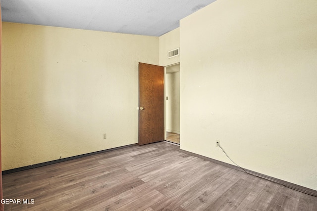 4112 Blackstone Ct, El Paso, TX 79922 - empty room featuring wood finished floors and baseboards