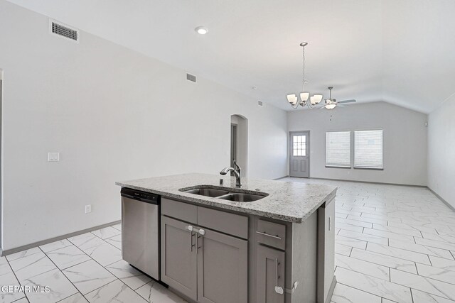 1129 Indigo Sky St, El Paso, TX 79928 - kitchen featuring dishwasher, a sink, light marble finish flooring, arched walkways, and gray cabinets