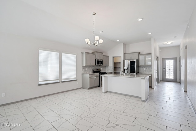1129 Indigo Sky St, El Paso, TX 79928 - kitchen with gray cabinetry, stainless steel appliances, light countertops, a chandelier, and plenty of natural light