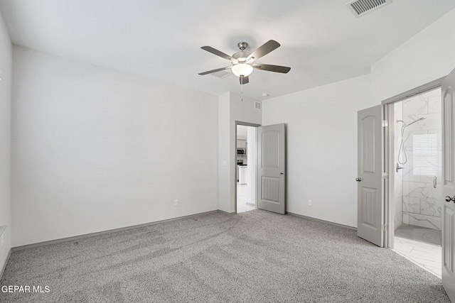 1129 Indigo Sky St, El Paso, TX 79928 - unfurnished bedroom featuring carpet flooring, ensuite bathroom, and a ceiling fan