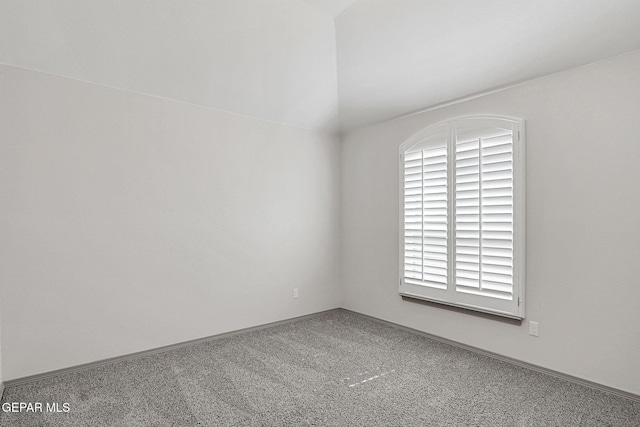 1129 Indigo Sky St, El Paso, TX 79928 - spare room featuring carpet floors, vaulted ceiling, and plenty of natural light
