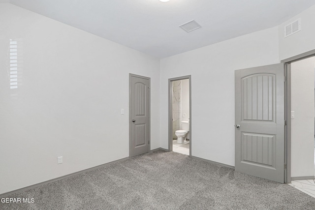 1129 Indigo Sky St, El Paso, TX 79928 - unfurnished bedroom with carpet floors, ensuite bathroom, and baseboards