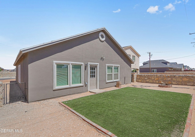 1129 Indigo Sky St, El Paso, TX 79928 - rear view of property featuring stucco siding and a patio area