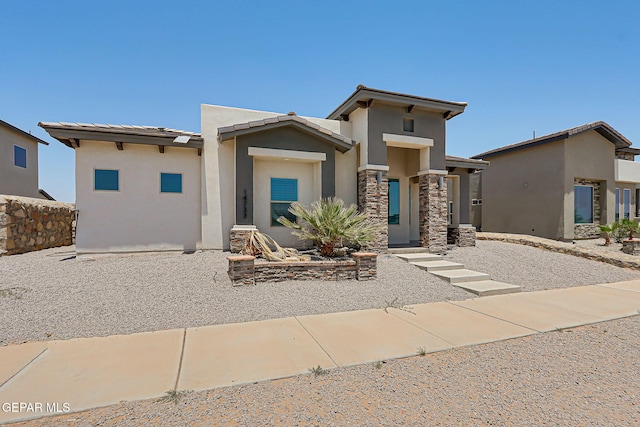 14733 Charles Foster Ave, El Paso, TX 79938 - view of front of property with stucco siding and stone siding