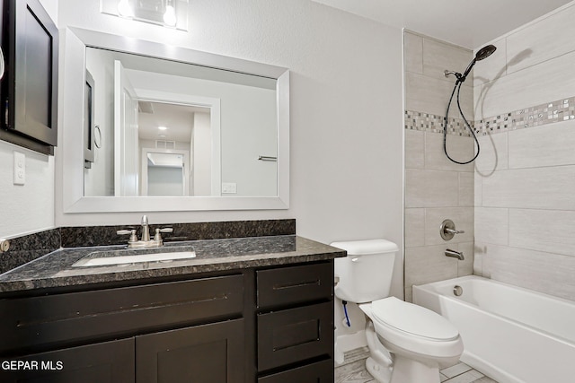 14733 Charles Foster Ave, El Paso, TX 79938 - bathroom featuring vanity, toilet, and shower / washtub combination