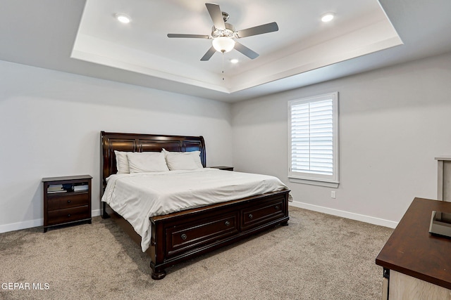 14733 Charles Foster Ave, El Paso, TX 79938 - carpeted bedroom featuring a raised ceiling, baseboards, ceiling fan, and recessed lighting