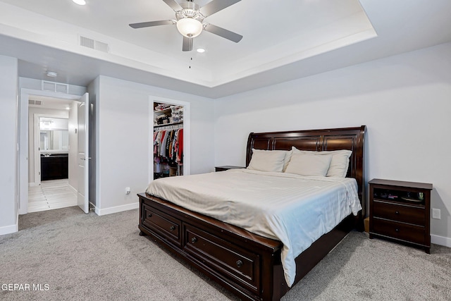 14733 Charles Foster Ave, El Paso, TX 79938 - bedroom featuring light colored carpet, baseboards, a tray ceiling, a closet, and recessed lighting