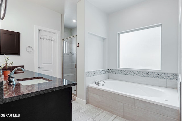 14733 Charles Foster Ave, El Paso, TX 79938 - bathroom with a stall shower, vanity, and a bath