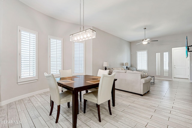 14733 Charles Foster Ave, El Paso, TX 79938 - dining room with light wood-style floors, ceiling fan, and baseboards