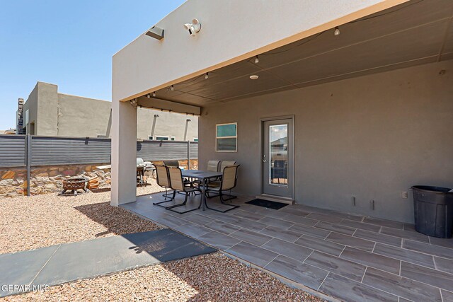 14733 Charles Foster Ave, El Paso, TX 79938 - view of patio with a fire pit and outdoor dining space