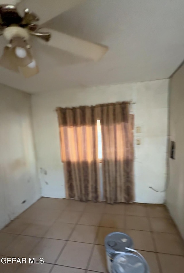 360 Sleepy Hollow St, El Paso, TX 79932 - unfurnished room with light tile patterned floors and ceiling fan