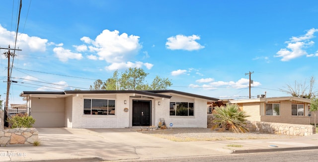 10109 Saigon Dr, El Paso, TX 79925 - view of front of property featuring brick siding and driveway