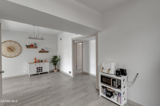 10109 Saigon Dr, El Paso, TX 79925 - interior space featuring light wood-type flooring and baseboards