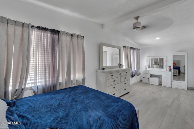 10109 Saigon Dr, El Paso, TX 79925 - bedroom with ceiling fan, multiple windows, and light wood-style floors