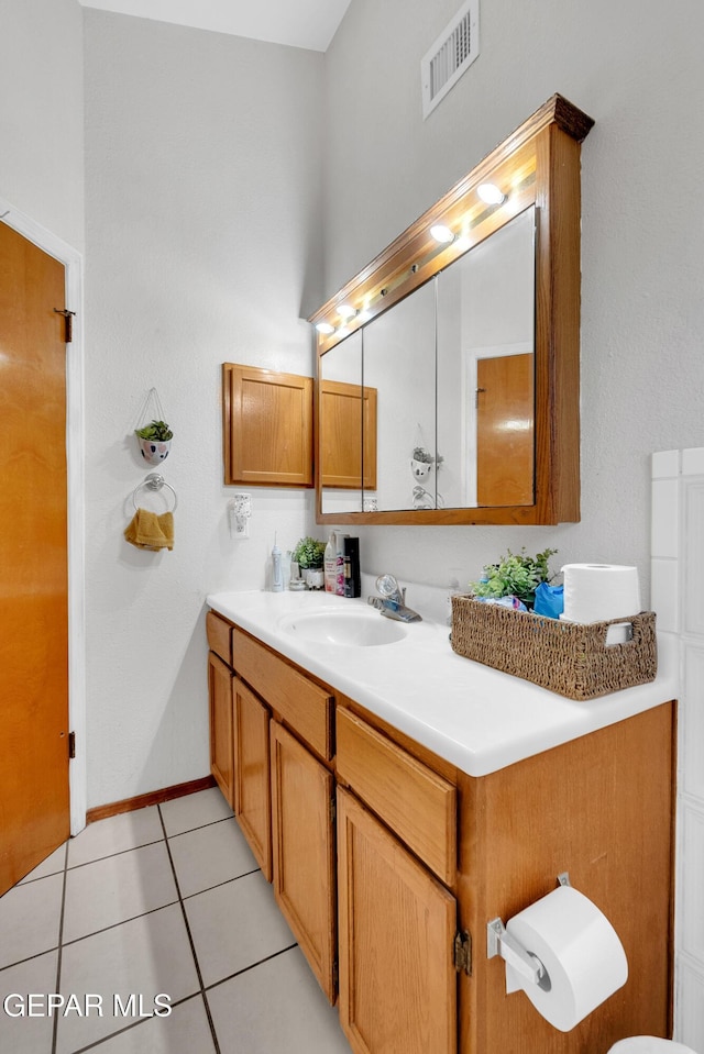 11185 Tenaha Ave, El Paso, TX 79936 - bathroom featuring vanity and tile patterned flooring