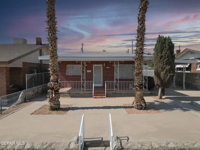 4013 Hueco Ave, El Paso, TX 79903 - view of front of property with a porch and brick siding