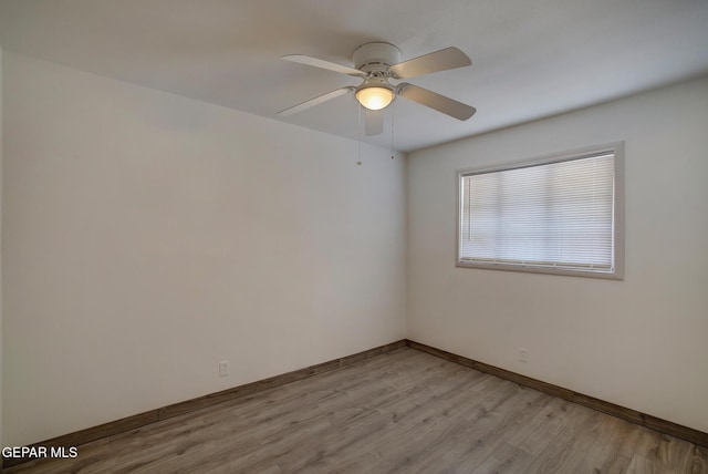 4013 Hueco Ave, El Paso, TX 79903 - spare room with light wood finished floors, a ceiling fan, and baseboards