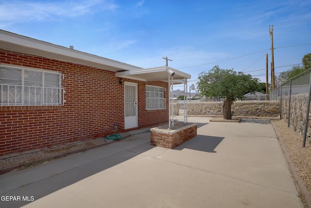 4013 Hueco Ave, El Paso, TX 79903 - fenced backyard featuring a patio