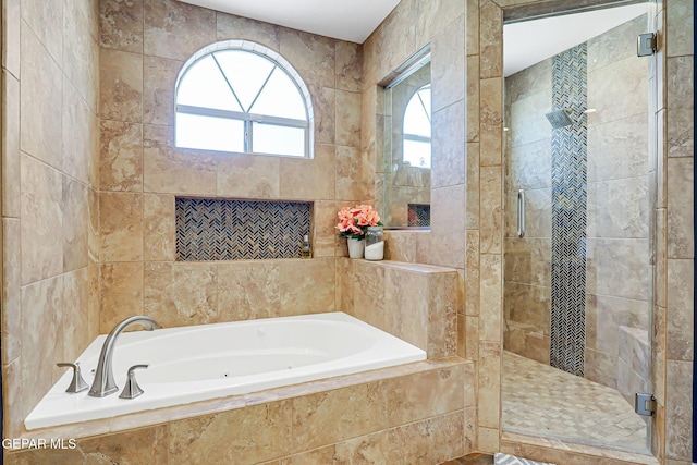 904 Las Palmas Way, El Paso, TX 79912 - full bath featuring a tub with jets, a stall shower, and tile walls