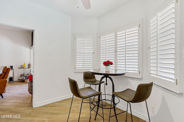 904 Las Palmas Way, El Paso, TX 79912 - dining area featuring baseboards, a ceiling fan, and light wood-style floors