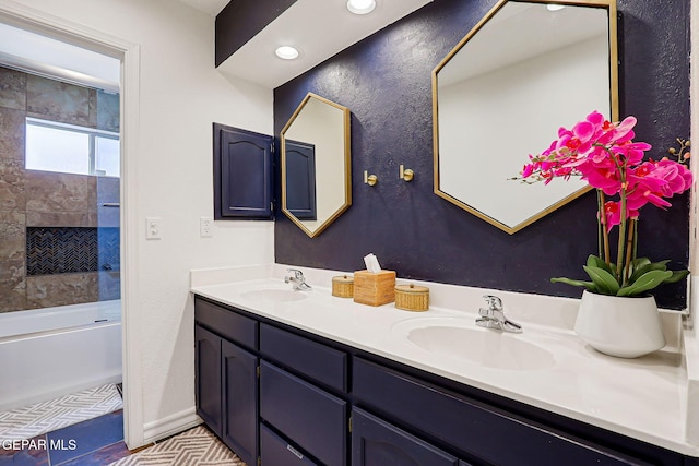 904 Las Palmas Way, El Paso, TX 79912 - full bath with double vanity, recessed lighting,  shower combination, baseboards, and tile patterned floors