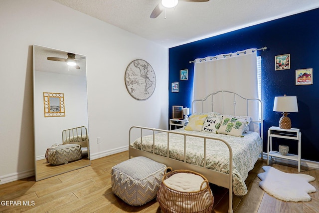 904 Las Palmas Way, El Paso, TX 79912 - bedroom with wood finished floors, a ceiling fan, and baseboards