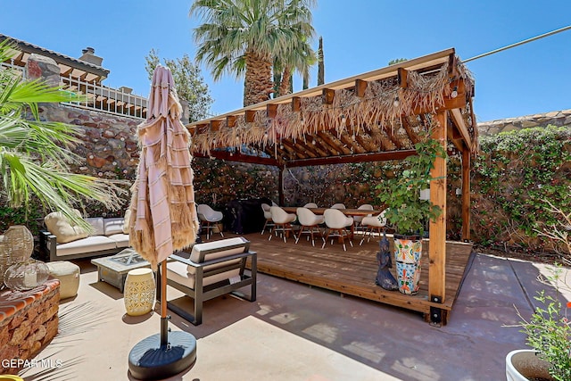 904 Las Palmas Way, El Paso, TX 79912 - view of patio featuring an outdoor living space with a fire pit, a gazebo, and a wooden deck