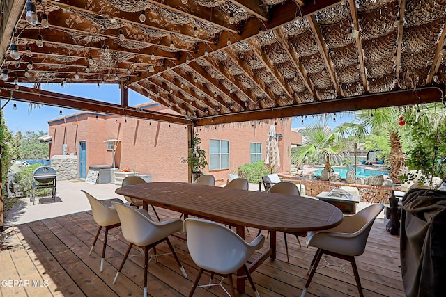 904 Las Palmas Way, El Paso, TX 79912 - deck featuring a pergola, outdoor dining space, an outdoor pool, and grilling area