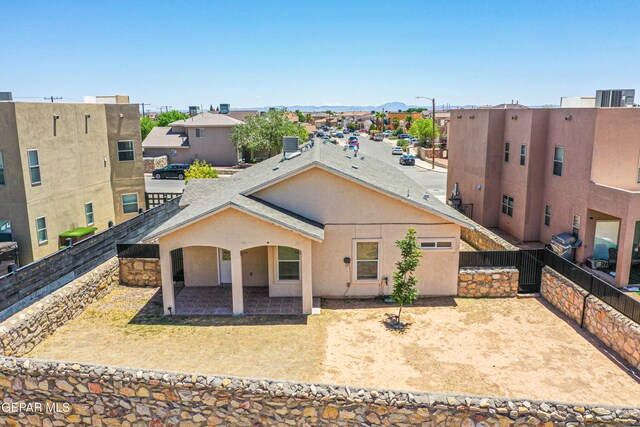 11361 Charles Reynolds Ln, El Paso, TX 79934 - view of front of property with a patio area, a fenced backyard, and stucco siding
