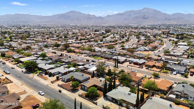9913 Bomarc St, El Paso, TX 79924 - aerial perspective of suburban area with a mountain backdrop