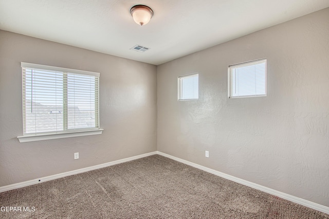 12772 Silver Streak Ave, El Paso, TX 79928 - carpeted empty room featuring baseboards