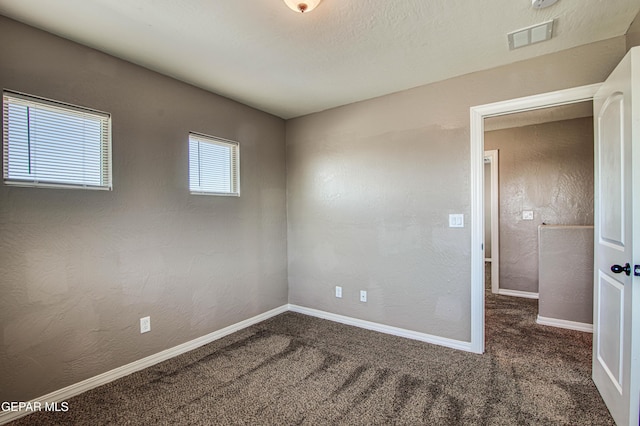 12772 Silver Streak Ave, El Paso, TX 79928 - carpeted spare room with baseboards