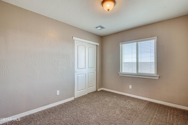 12772 Silver Streak Ave, El Paso, TX 79928 - spare room featuring carpet flooring and baseboards