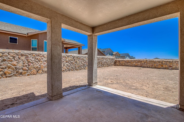 12772 Silver Streak Ave, El Paso, TX 79928 - fenced backyard featuring a patio