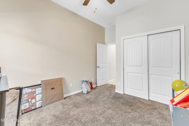 2367 Enchanted Peaks Ln, El Paso, TX 79911 - unfurnished bedroom with carpet, a closet, a ceiling fan, and baseboards