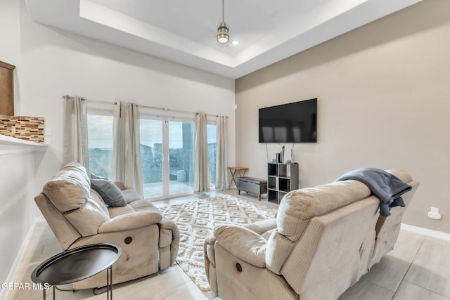 2367 Enchanted Peaks Ln, El Paso, TX 79911 - living area featuring a towering ceiling, baseboards, and recessed lighting