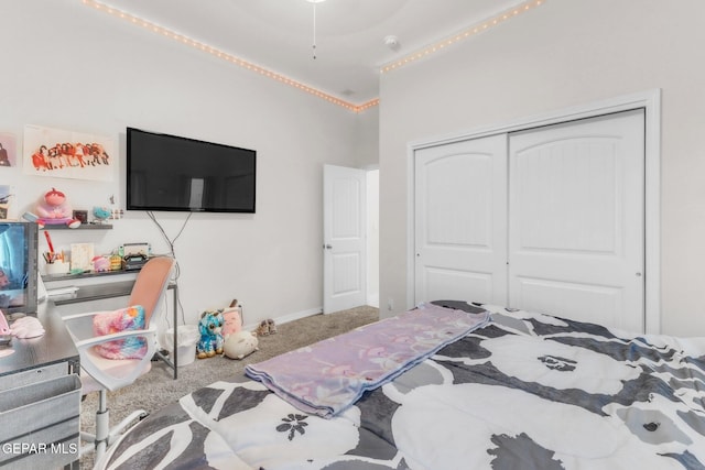 2367 Enchanted Peaks Ln, El Paso, TX 79911 - bedroom featuring carpet floors, a closet, and baseboards