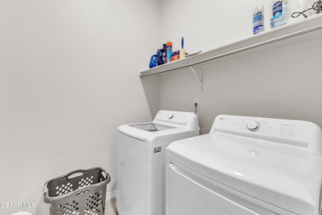 2367 Enchanted Peaks Ln, El Paso, TX 79911 - laundry area with washer and clothes dryer