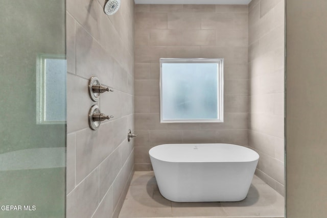 2367 Enchanted Peaks Ln, El Paso, TX 79911 - full bathroom featuring a tile shower and a freestanding tub