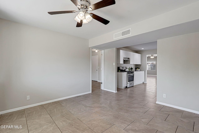 10321 Thor St, El Paso, TX 79924 - unfurnished living room with ceiling fan, light tile patterned floors, and baseboards