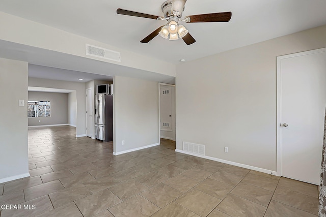 10321 Thor St, El Paso, TX 79924 - unfurnished room featuring ceiling fan, light tile patterned floors, and baseboards