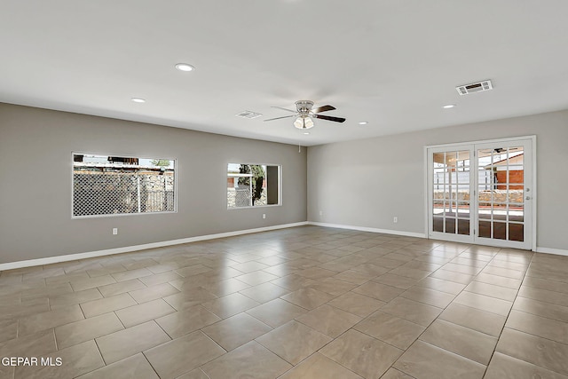 10321 Thor St, El Paso, TX 79924 - tiled spare room with a ceiling fan, recessed lighting, and baseboards